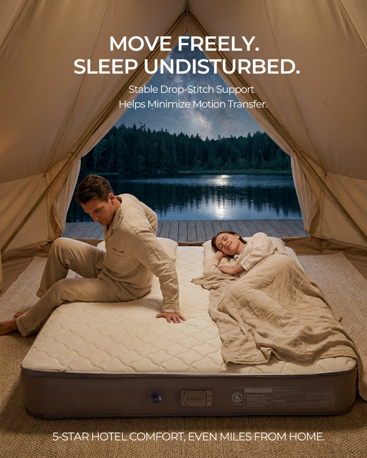Two sleepers at night on the Sailflux drop-stitch air mattress inside a tent, showing reduced motion transfer
